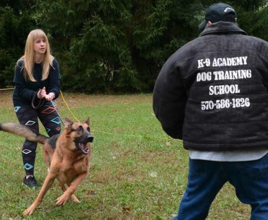 Woman trains to use dog for personal protection